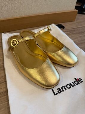 Larroudé Blair Flat Mule In Gold Metallic Leather